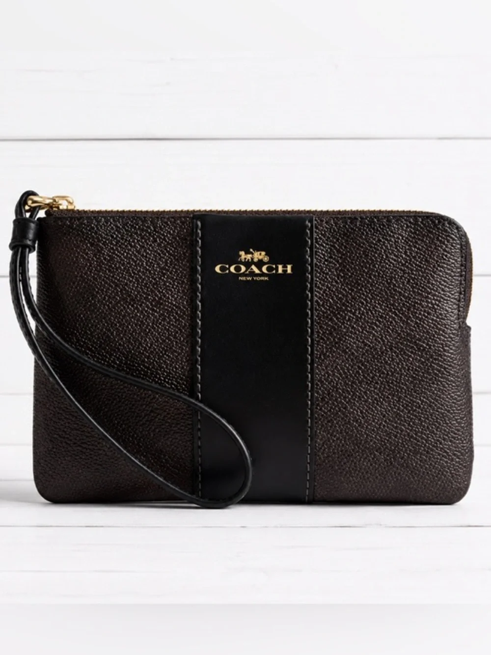 COACH  corner zip wristlet in signature C pattern brown and black